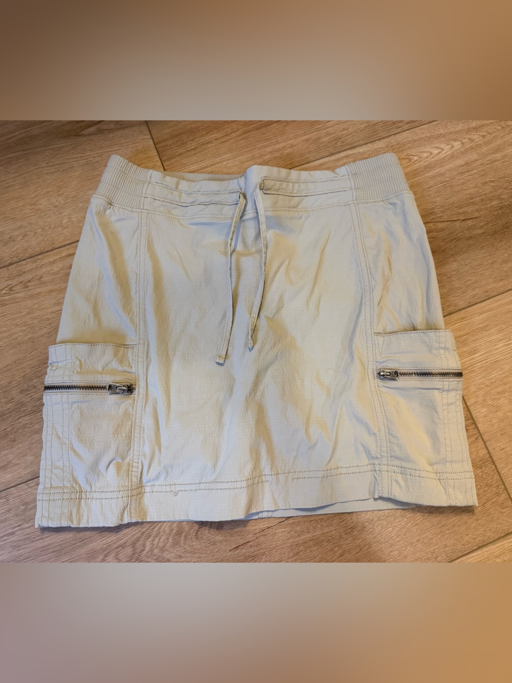 Athleta Cream Drawstring Skort with Zip Cargo Pockets